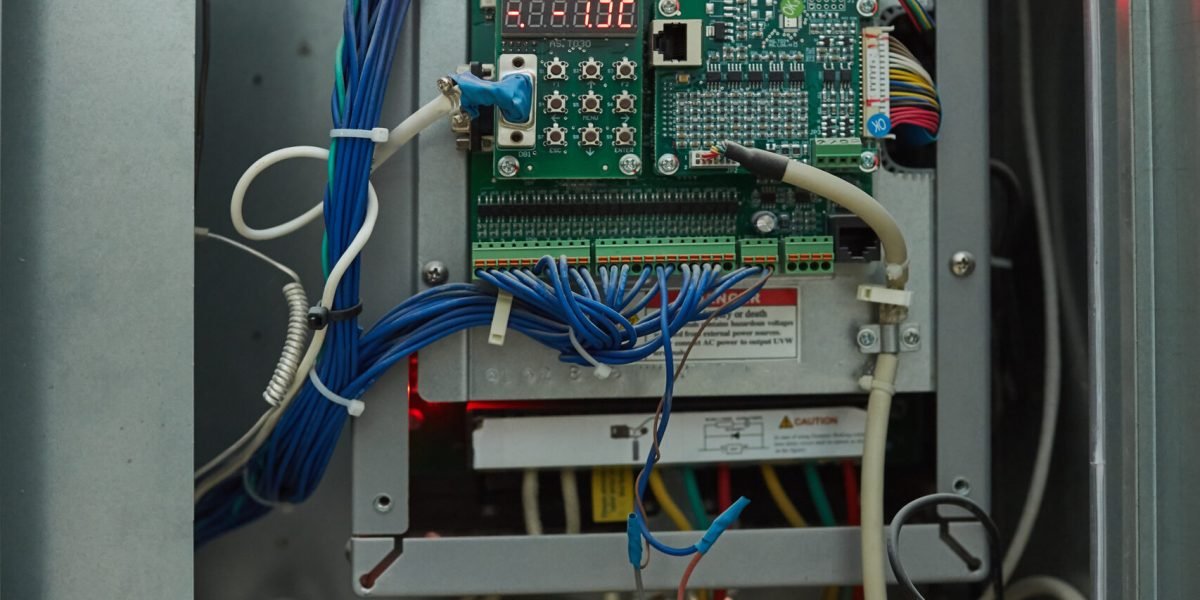 Background image of open electrical switchboard or security system board inside HUB, copy space